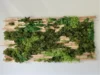 Wanddekoration aus Moos und Holz