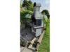 Ein gemauerter Gartengrill mit Kamin.